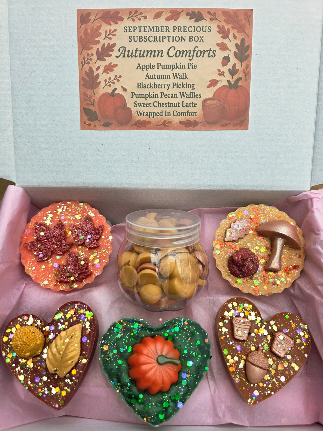 Autumn Comforts Wax Melts Box with cozy scents like Apple Pumpkin Pie, Autumn Walk, Blackberry Picking, Pumpkin Waffles, Chestnut Latte, and more.