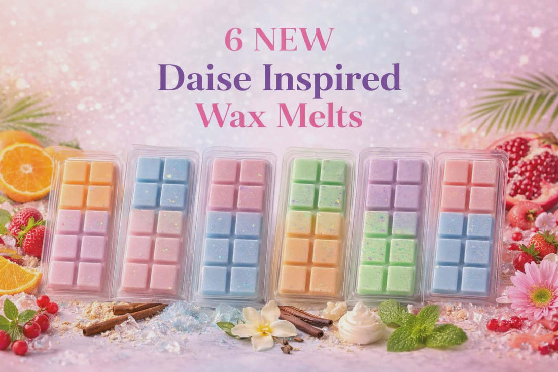 handmade wax melts glowing in warm sunlight on a cozy wooden tray