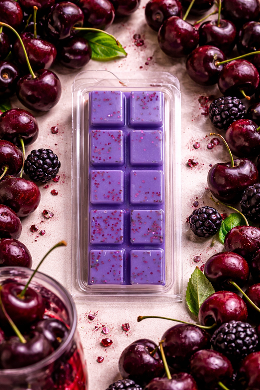 Black cherry wax melts with cherry background.