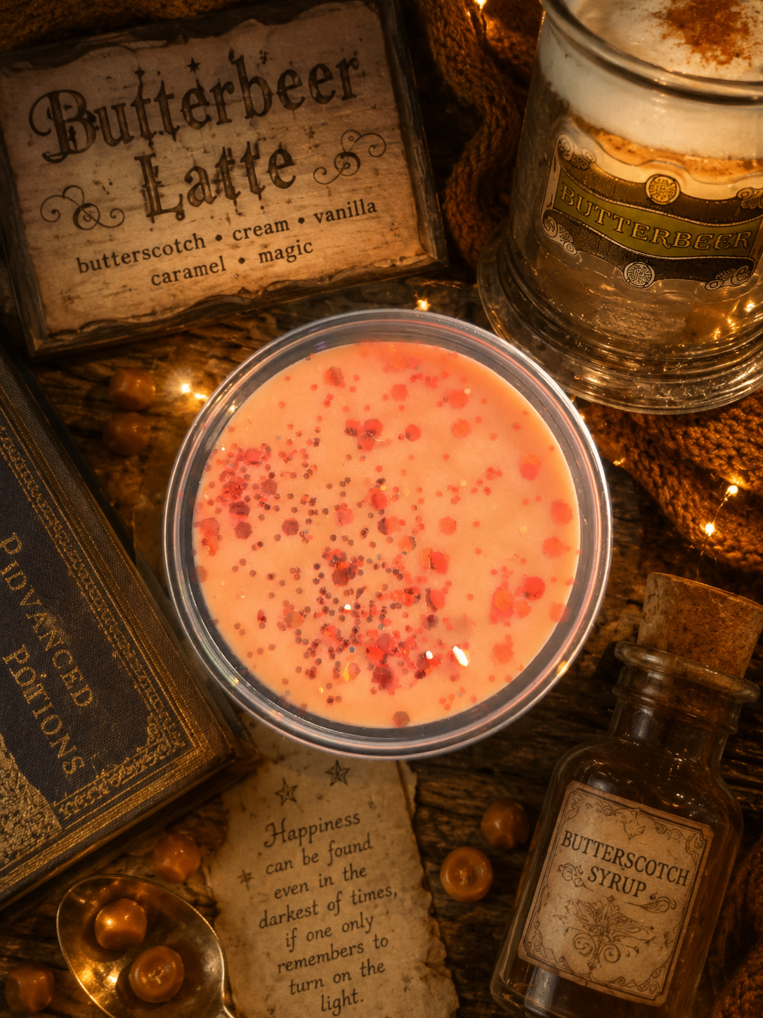 Butterbeer latte wax melt with ingredients and a jar labeled 'Butterbeer' on a decorative background.