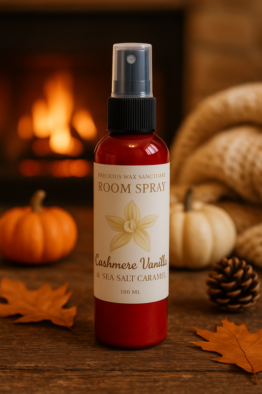 A bottle of Cashmere Vanilla & Sea Salt Caramel room spray featuring a sophisticated design, with warm vanilla, sea salt caramel, sandalwood, and tonka bean notes.