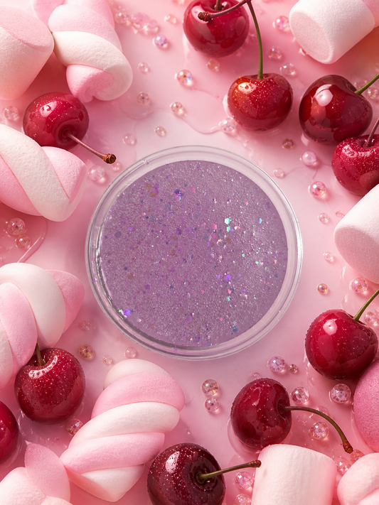 Cherry and marshmallow fluff gel wax melt surrounded by cherries and marshmallows.