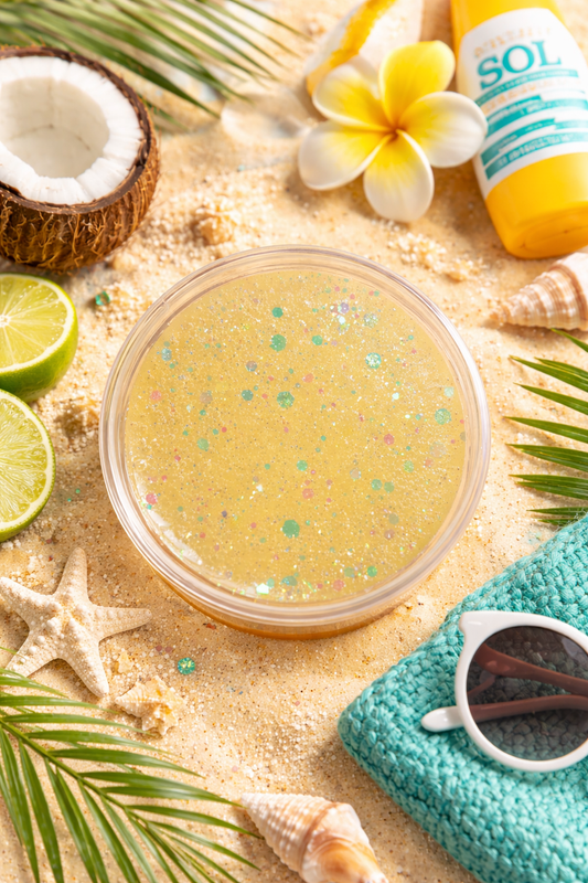 Gel wax melt pot with beach-themed elements like coconut, lime, and flowers.