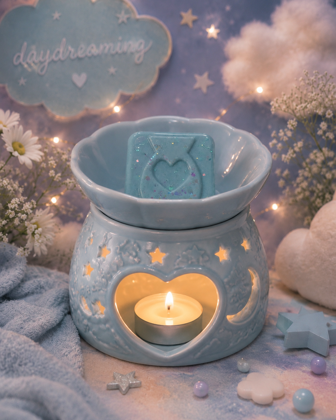 Daydreaming wax melt in burner with magical dreamy background. 