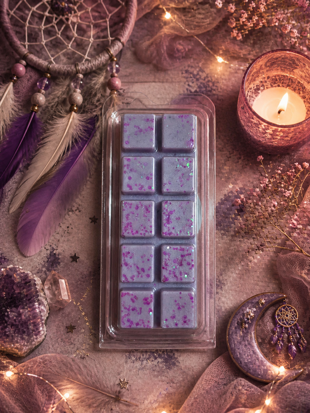 Block of purple wax melts in a mold surrounded by decorative items like a dreamcatcher and candles.
