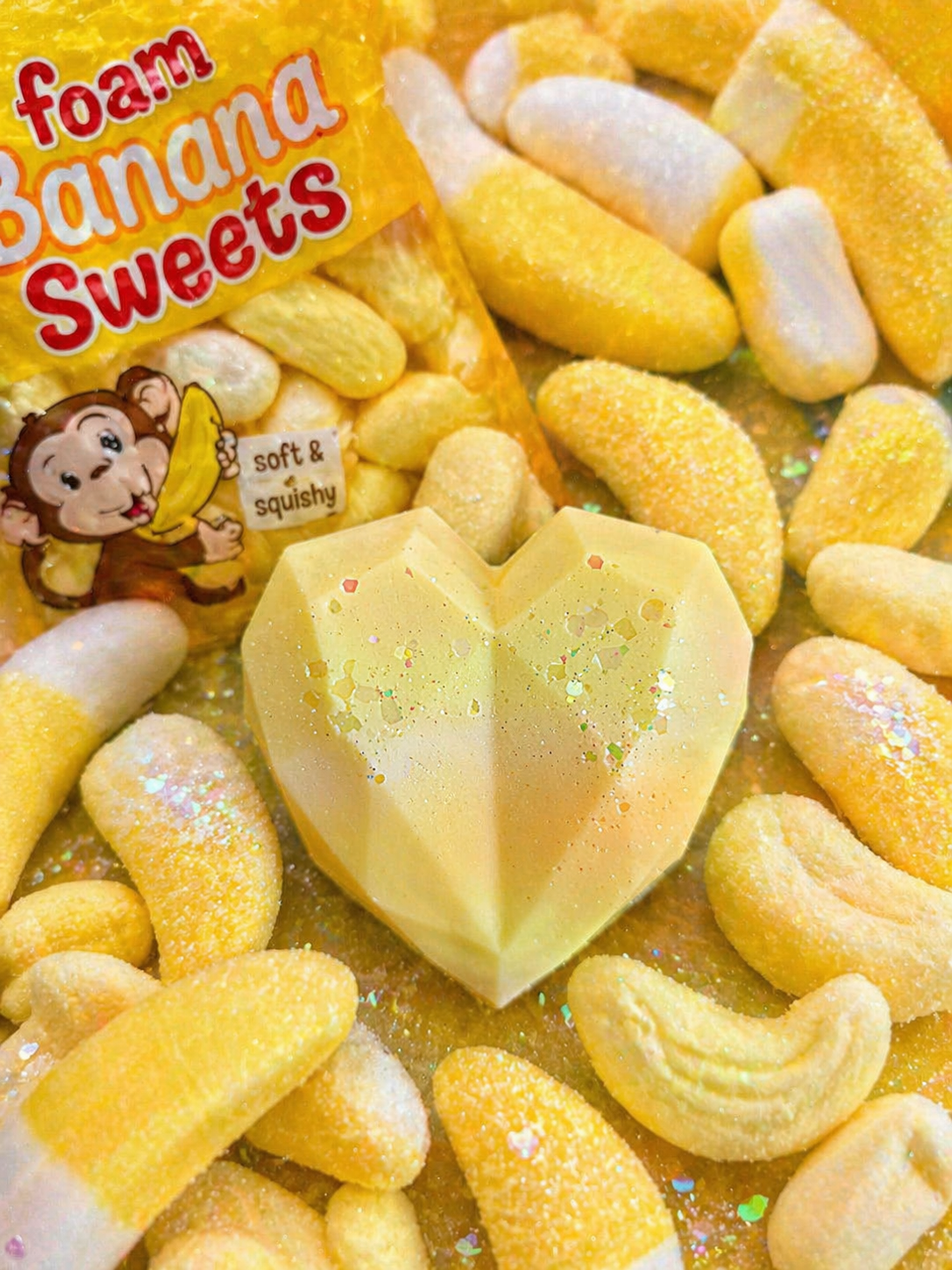 Foam banana wax melts with packaging featuring a monkey character.