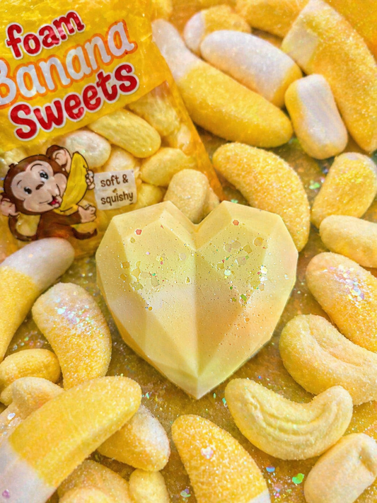 Foam banana wax melts with packaging featuring a monkey character.