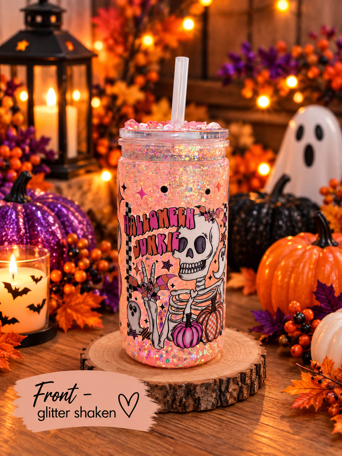 160z Halloween snowglobe glitter tumbler with spooky halloween decor. front glitter.