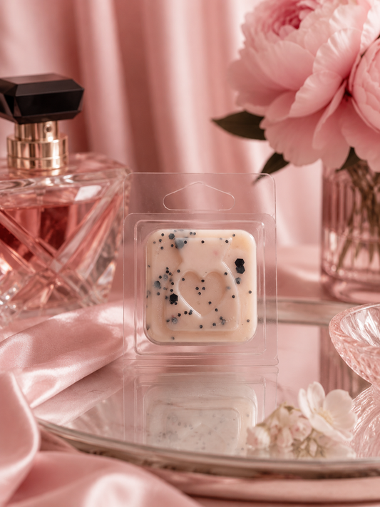 paradoxe perfume scented wax melt sample with perfume floral background.