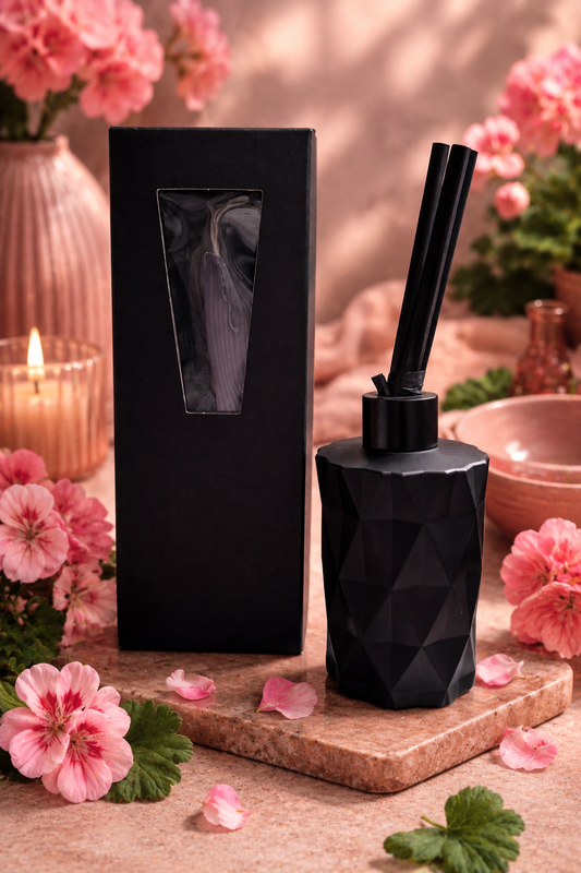 Matte black diffuser surrounded by roses