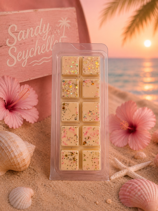 Sandy seychelles wax melt on beach with summer decor.