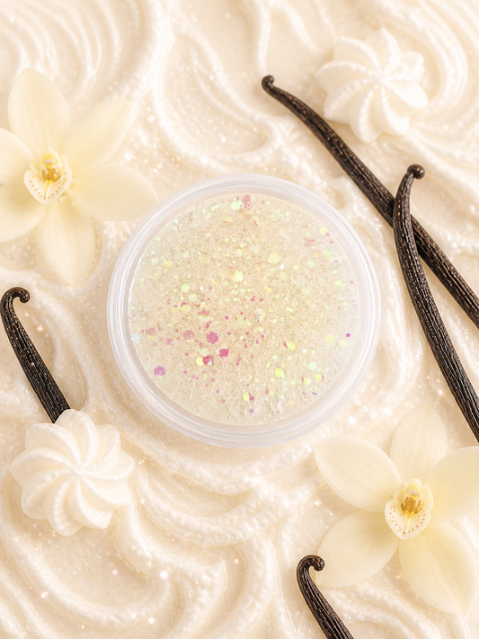 Small container of sweet whipped cream gel wax melt with vanilla beans and flowers on a creamy background