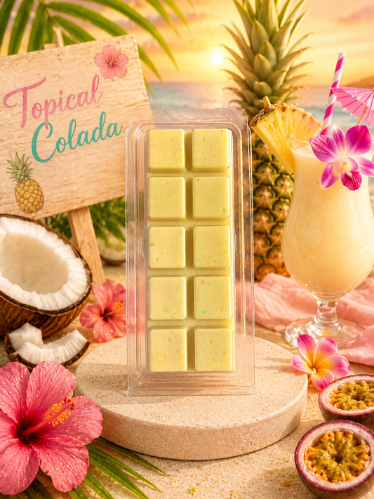 Topical Colada wax melts with tropical decor including a pineapple, coconut, and flowers.