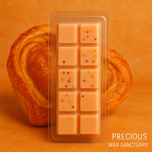 Create a sweet, comforting, and delightfully warm atmosphere with a bright citrus note. Our 'Warm Orange Danish' wax melt is perfect for a touch of indulgence and a happy, cozy vibe.