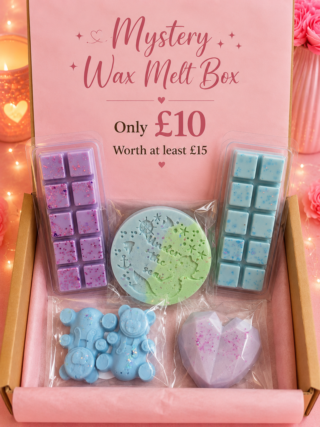 Example Mystery Wax Melt Box featuring pastel handmade wax melts in a brown gift box with pink tissue paper.